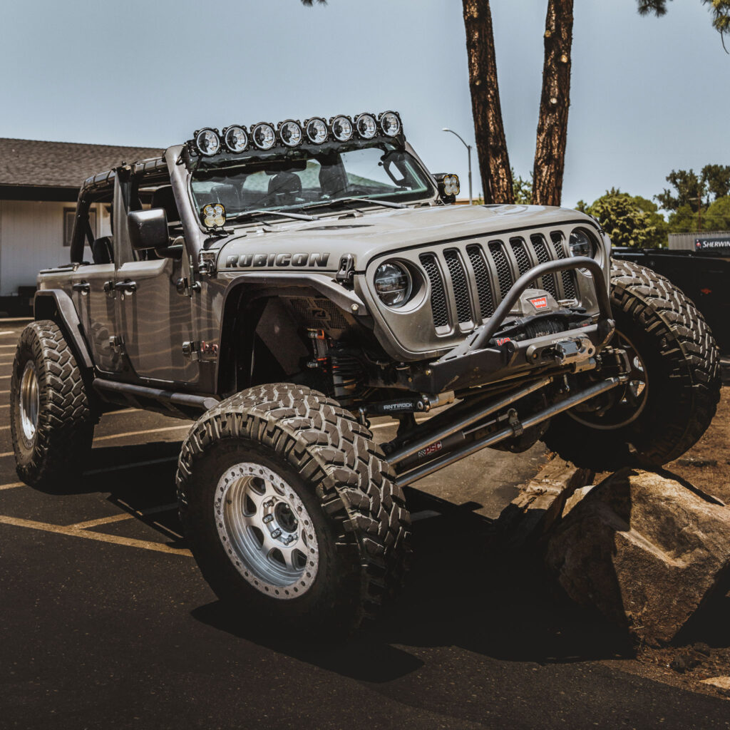 Summit 4X4 Companys JLU Rock Crawler Parked outside the shop.