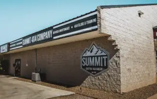 Exterior view of Summit 4x4 Company building in Prescott AZ with logo and signage