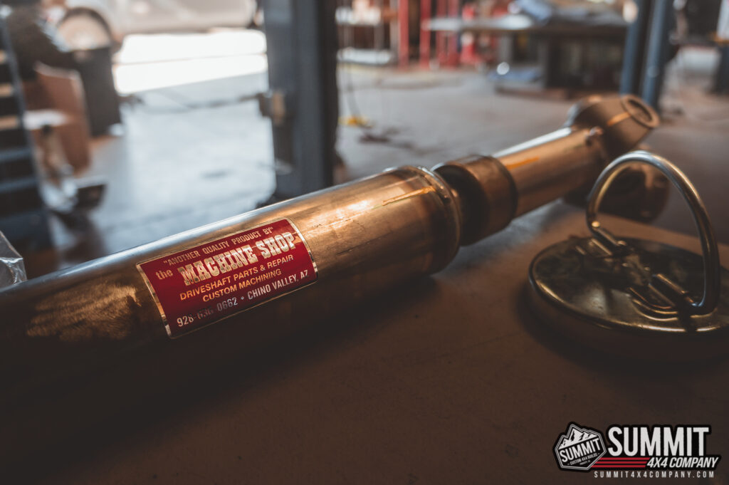 Custom driveshaft part for off-road vehicle repair at Summit 4x4 Company